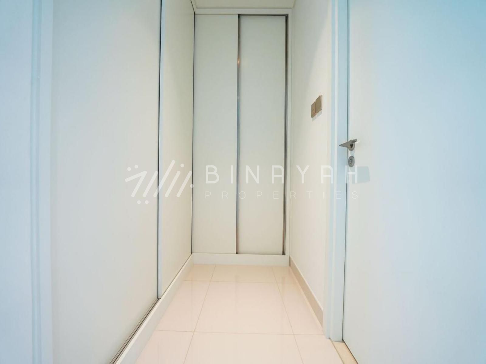 WhatsApp_Image_2026-05-20_at_12.01.12_PM_watermarked Luxury 2BR | Beach Access | Sea View