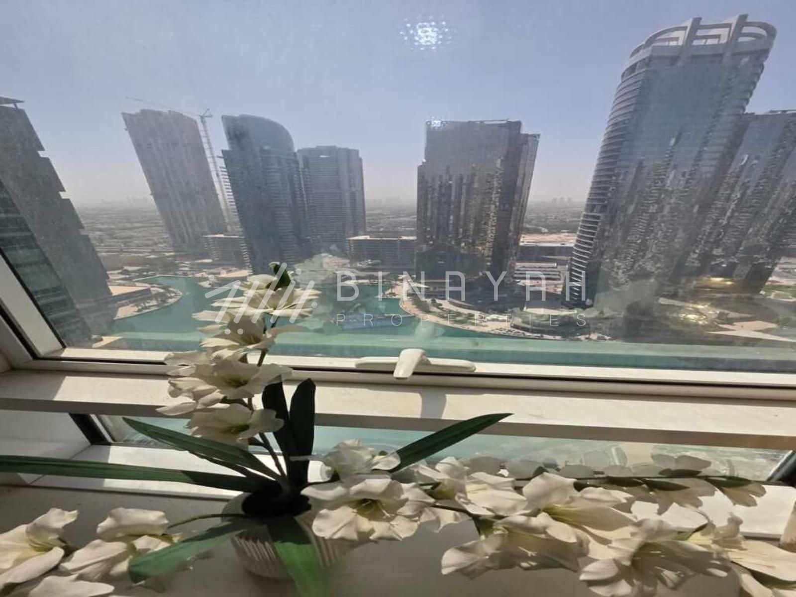 WhatsApp_Image_2026-06-17_at_1.29.22_PM_watermarked 1 Bedroom | High Floor | Near Metro | Lake View